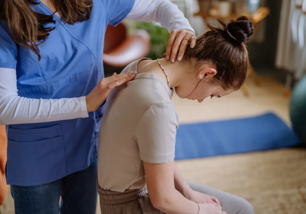 teenage girl doing exercise with a nurse 2023 11 27 04 57 36 utc@2x